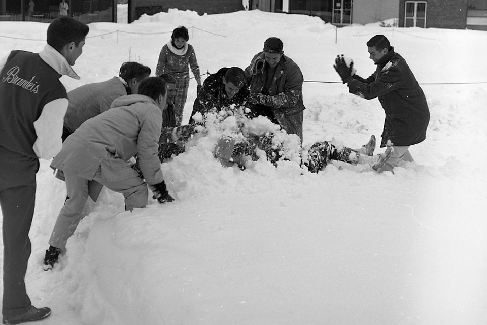 Students play around in the snow