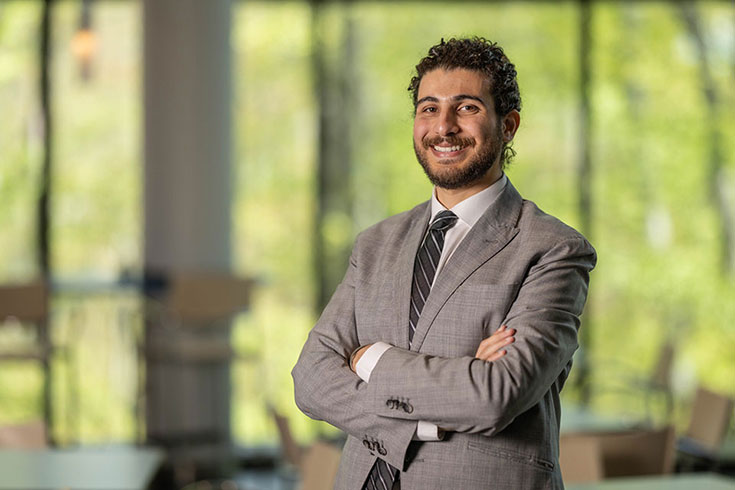 Peter Thabet wearing a suit and tie
