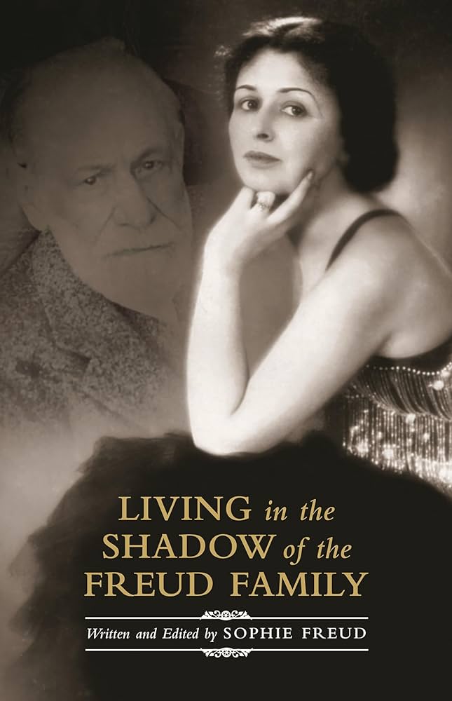 Book cover of "Living in the Shadow of the Freud Family." Image of Sophie Freud with the face of Sigmund Freud in the background. 