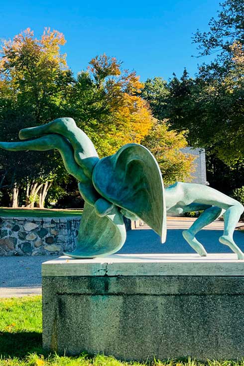 sculpture of two figures wrestling