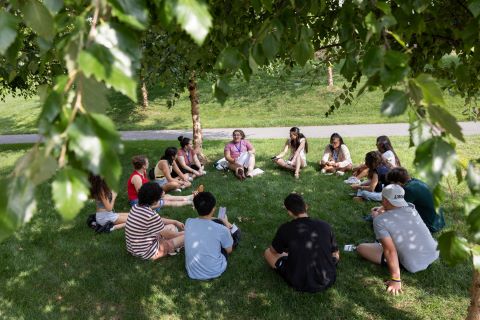 A group of students sitting in a circle