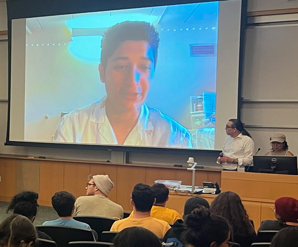 Student Union President on screen in classroom