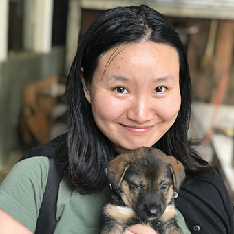 Hui Wen (holding a puppy)