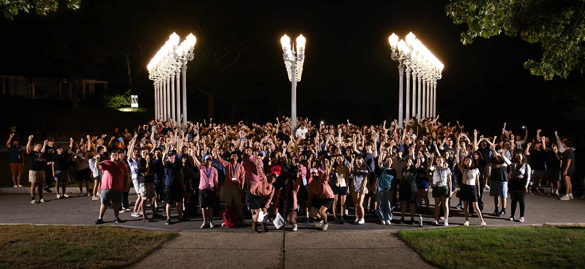 The class of 2028 outside in front of the Light of Reason