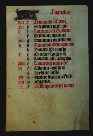 Page 8r. with a large illuminated letter and the month (August in Latin). The rest of the page is lettered by hand with a list, each line has a red letter on the left in sequence from a - g (presumably the days of the week), and then it starts again from a. In the left margin are some notes in red corresponding to some of the lines. 