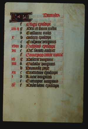 Page 12r with a large illuminated letter and the month (December in Latin). The rest of the page is lettered by hand with a list, each line has a red letter on the left in sequence from a - g (presumably the days of the week), and then it starts again from a. In the left margin are some notes in red corresponding to some of the lines. 