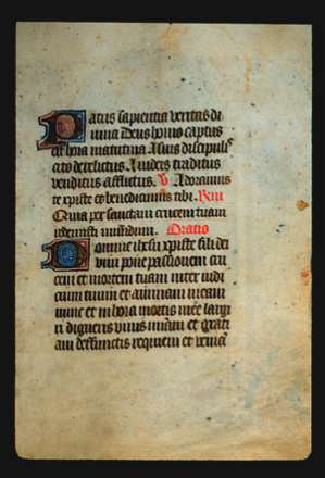 Page 40r, containing a dense block of blackletter text, with 2 illuminated initial letter and 3 red inked words.