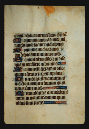 Page 44r, containing a dense block of blackletter text, with 6  illuminated initial letters and  3  horizontal ornamental element.s that fill the space between the end of a sentence and the right margin.  