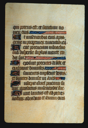 Page 63r, containing a dense block of blackletter text, with 6 illuminated initial letters and 4 horizontal ornaments that fill the space from the end of a sentence to the right margin.