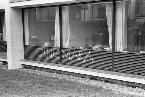 Graffiti on a campus building: "Cinemarx."