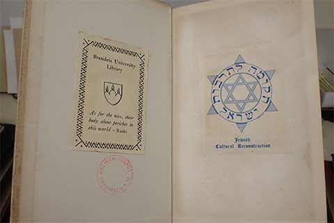 Inside cover and title page with Brandeis library bookplate and Offenbach stamp.