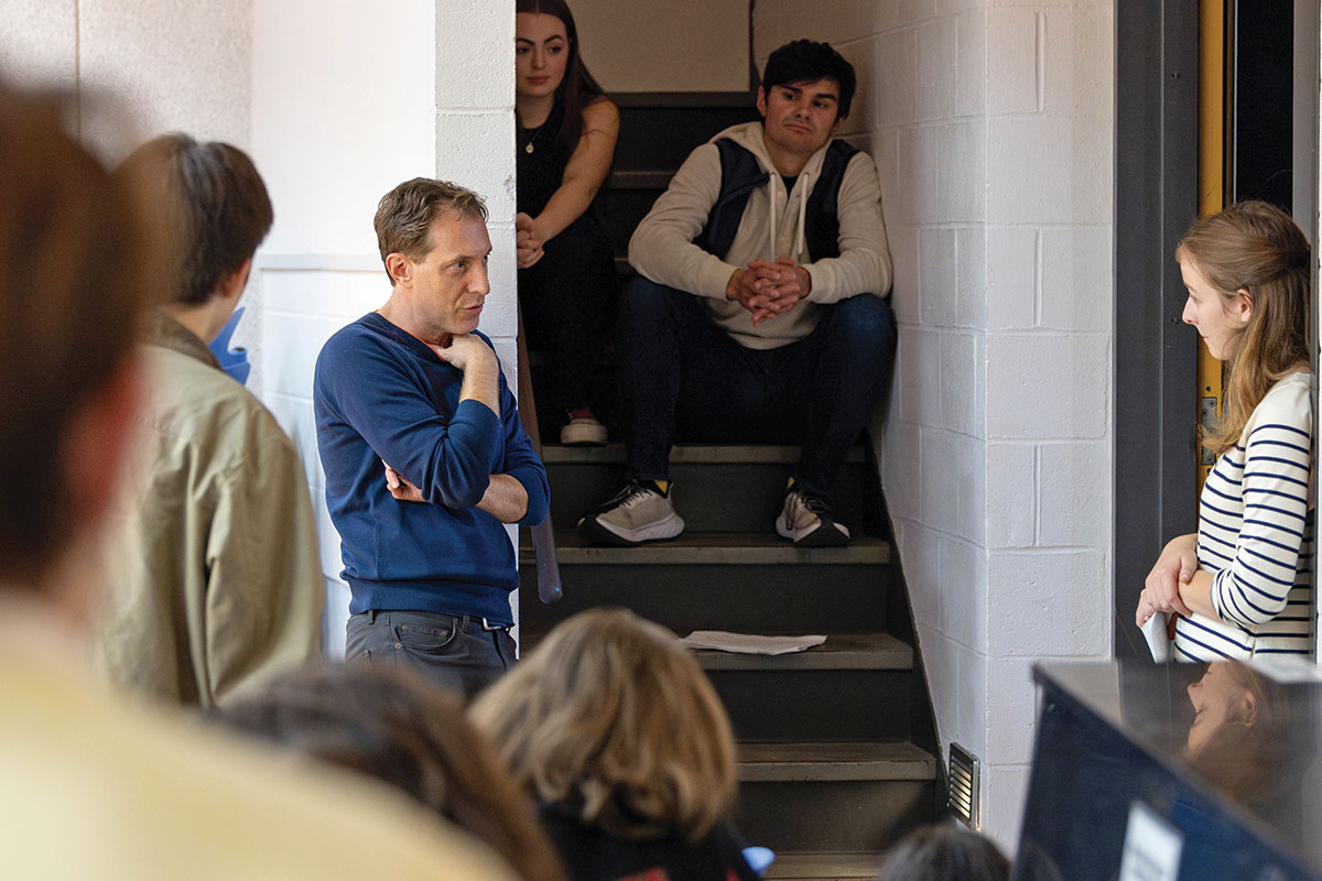 Troyanovsky speaks to a group of students.