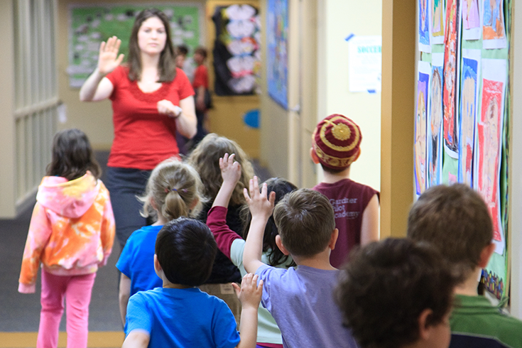 school kids in front of a teacher