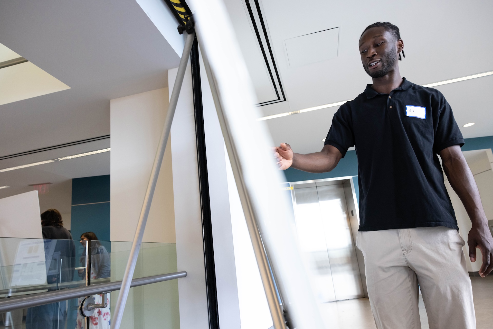 Gilbert Otoo at a poster session